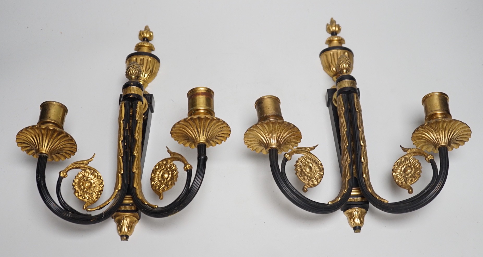 A pair of ormolu 2 branch wall lights, 32cms high